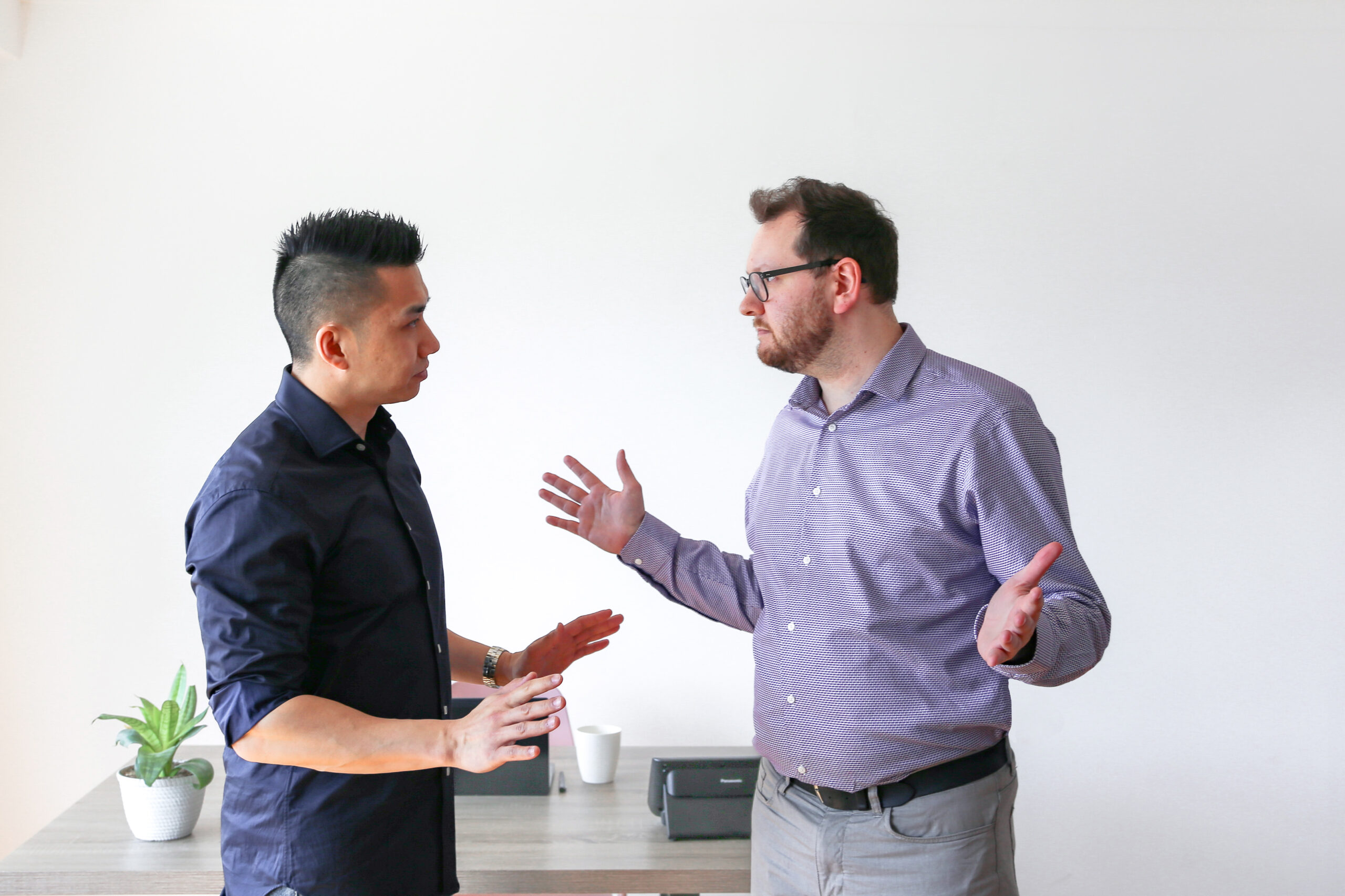 two men in conflict having a conversation